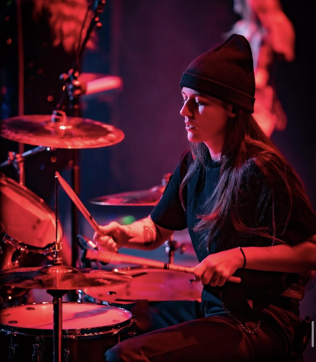 ACB playing under red stage light
